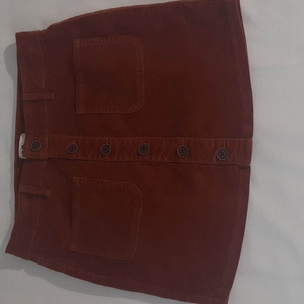 SO Girls Size 16 Corduroy skirt. Burnt‎ Orange, NWOT. Waist sinches to fit.